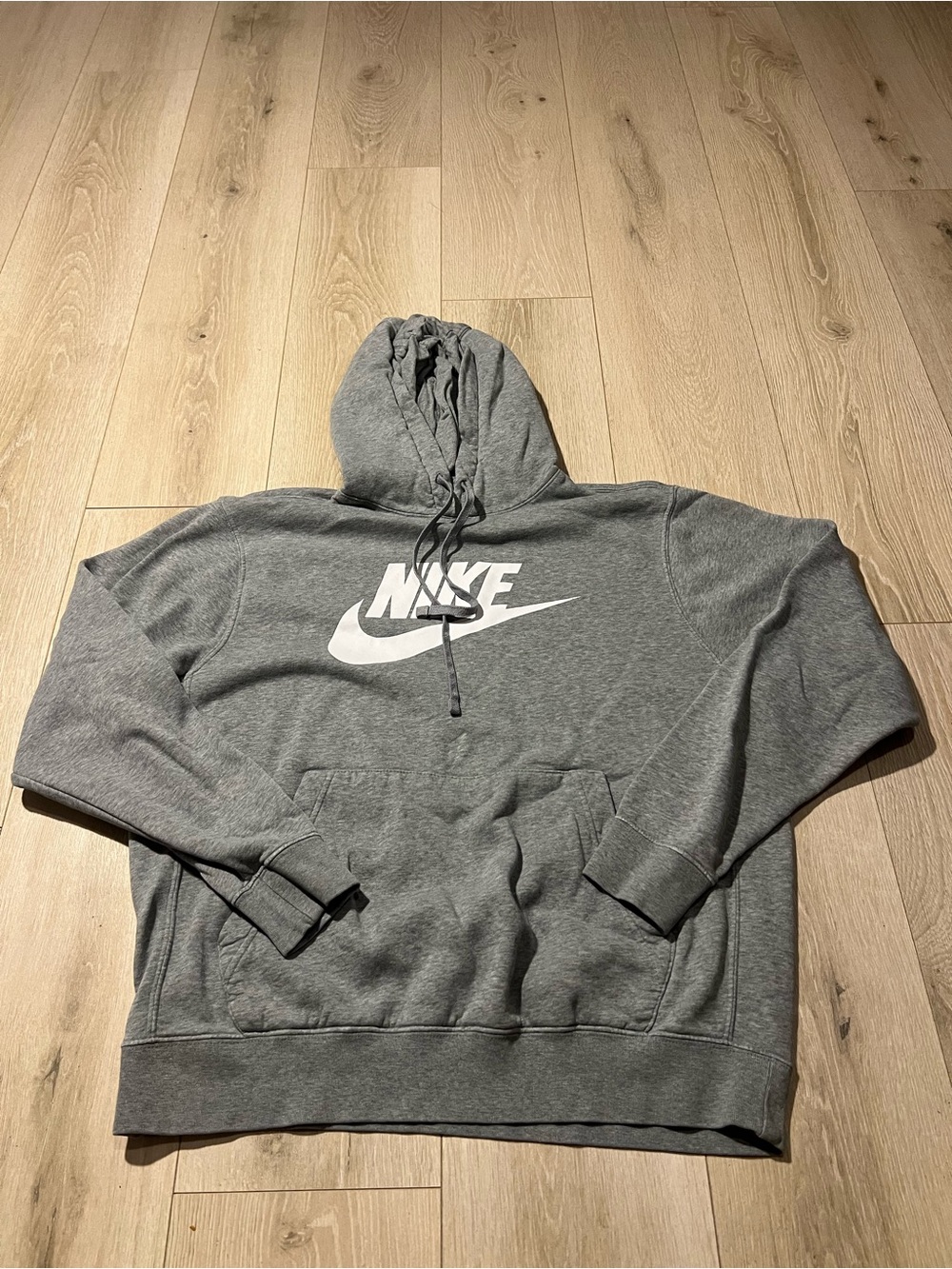 Nike Gray Pullover Hoodie with White Swoosh Logo